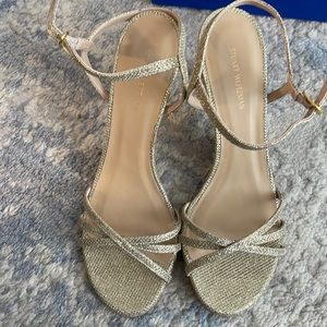 Stuart Weitzman gold heels. Never worn